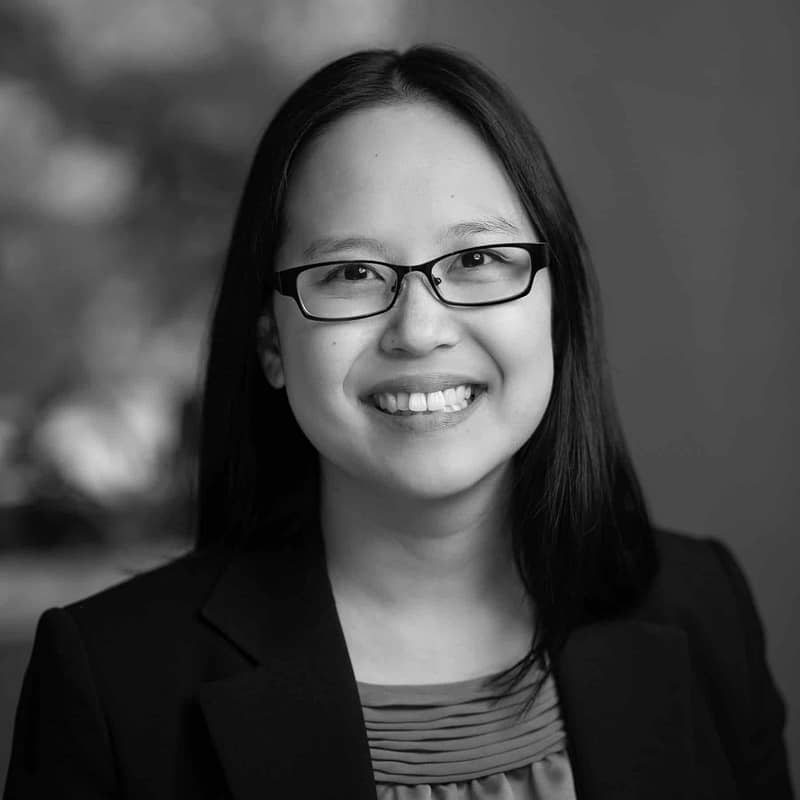 Mercy Hansen's headshot in office space in black and white.