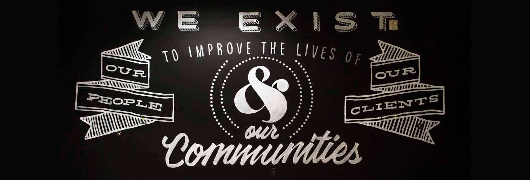 A black and white graphic with our Aldrich why stating "we exist to improved the lives of our people, our clients, and our communities.