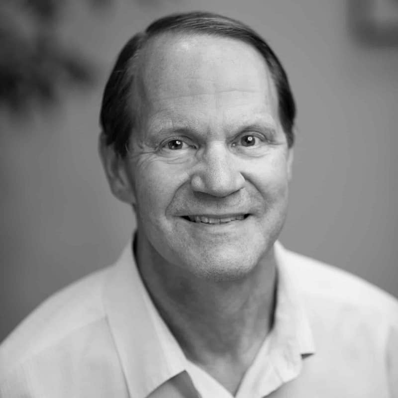 Terry Griffin headshot in black and white in an office space