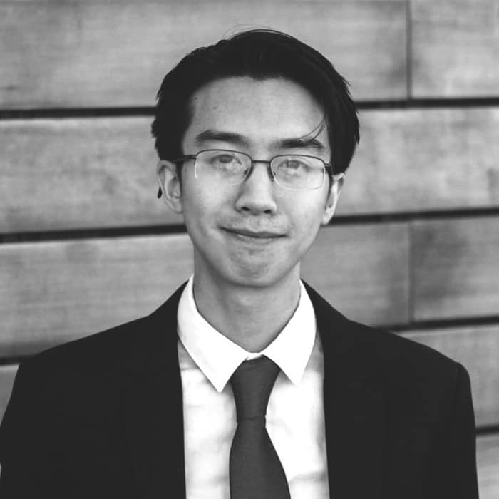 Tommy Ngo's headshot in black and white.