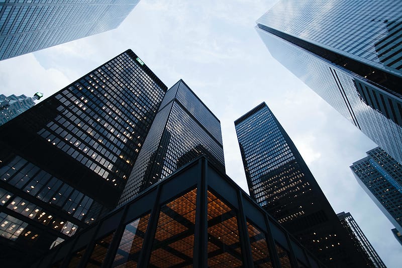 photo looking up at skyscrapers