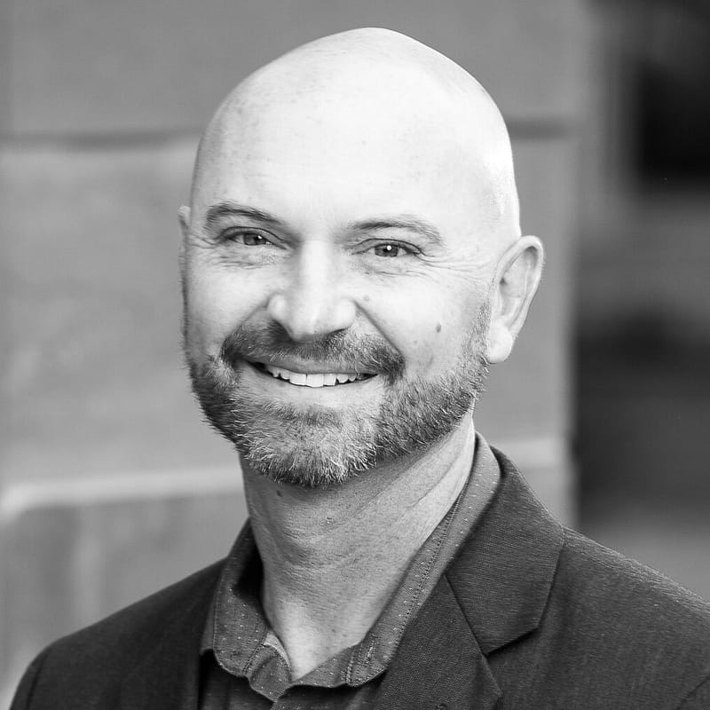 Andrew Davidson's headshot in black and white.