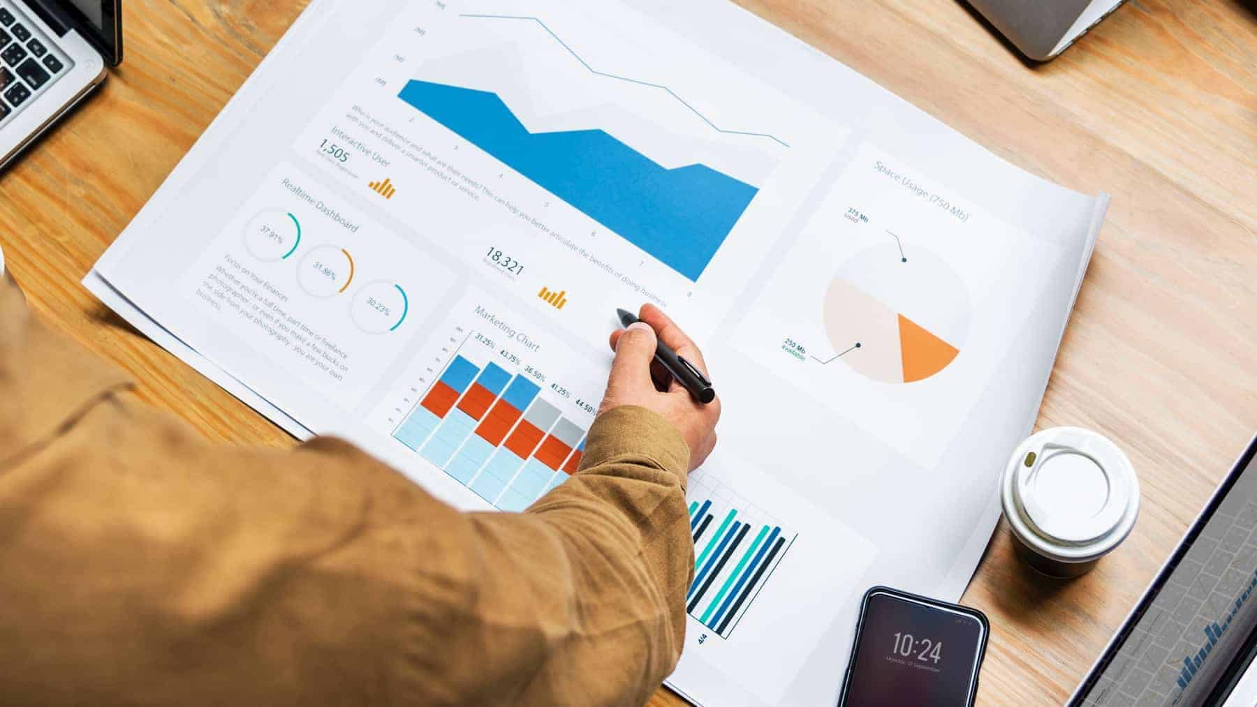 A person holding a pen over a