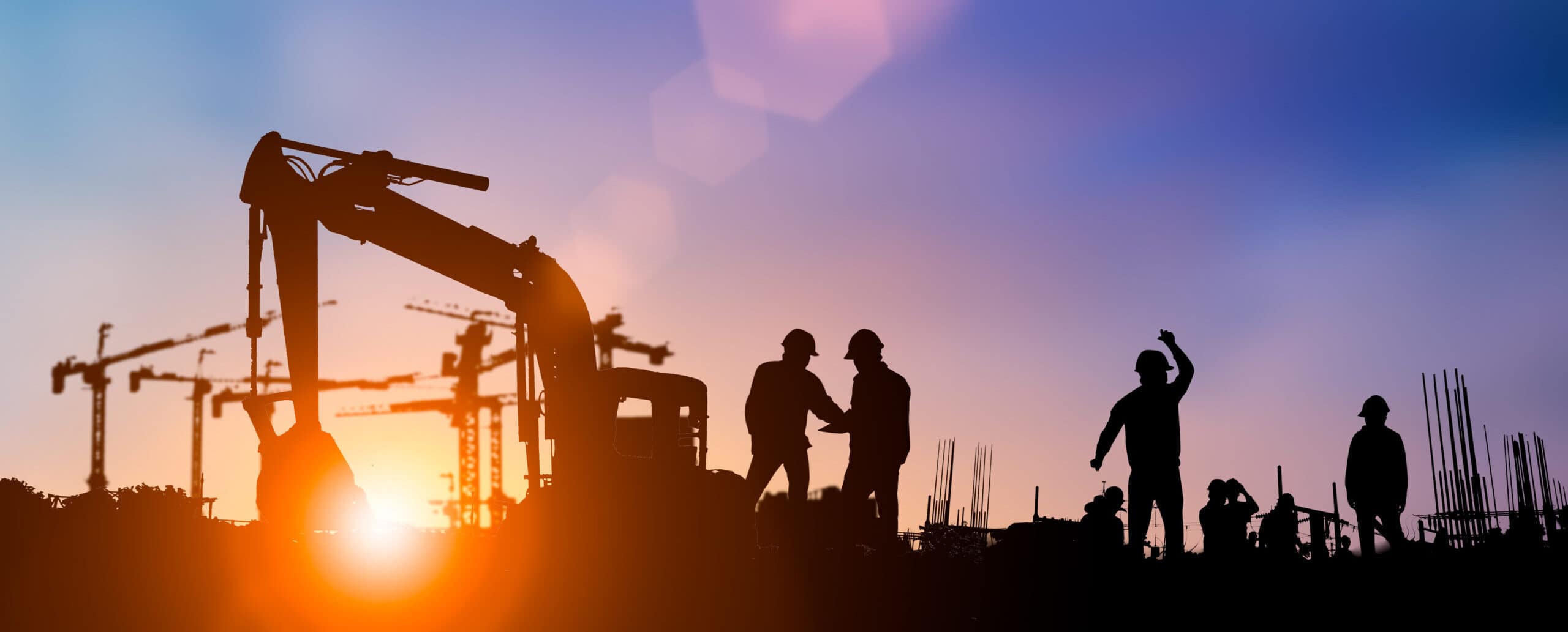 Silhouette of engineer and construction team working at site.