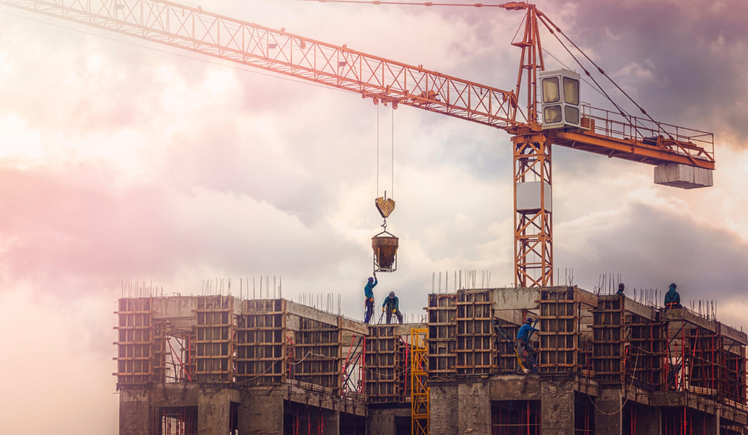 Construction workers on high rise, which is an industry Aldrich has served for more than 30 years. Aldrich was ranked #16 in Construction Executive's Top 50 Construction Accounting Firms list for 2024.