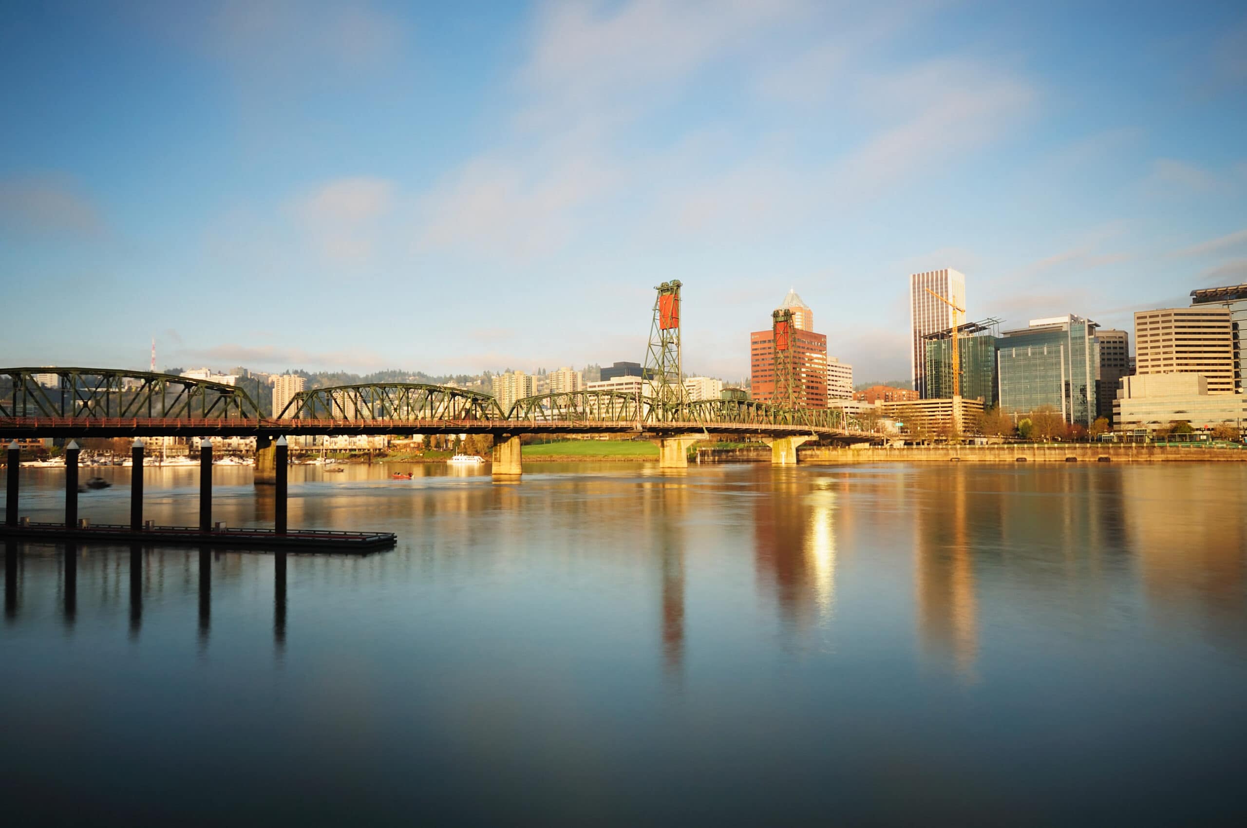Portland skyline, bridge, and beautiful sky, where Aldrich, who offers accounting/tax/audit, cybersecurity consulting, transaction, wealth, and corporate retirement plan services, is a sponsor of the Portland Thorns and Fire.