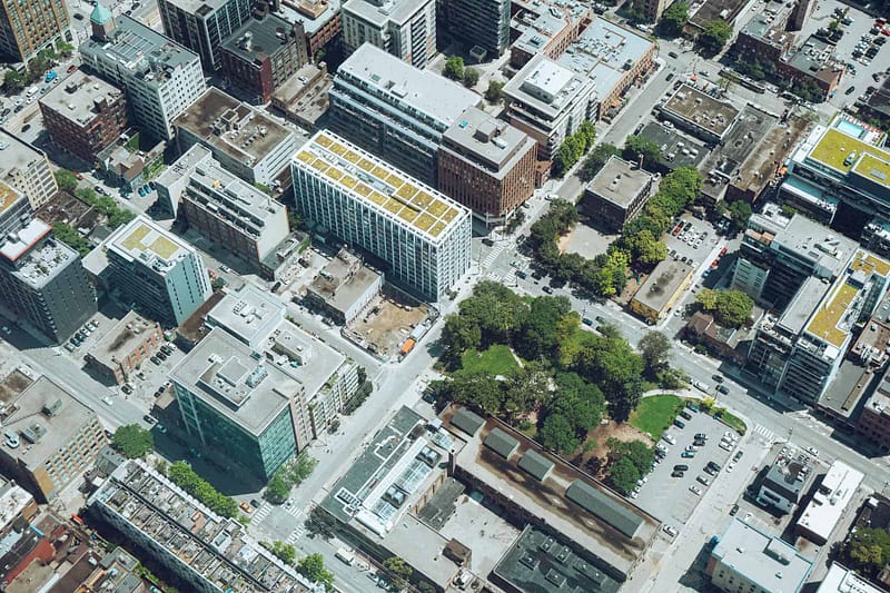A bird's eye view of city skyscrapers, in which Aldrich provides commercial real estate tax and accounting services.