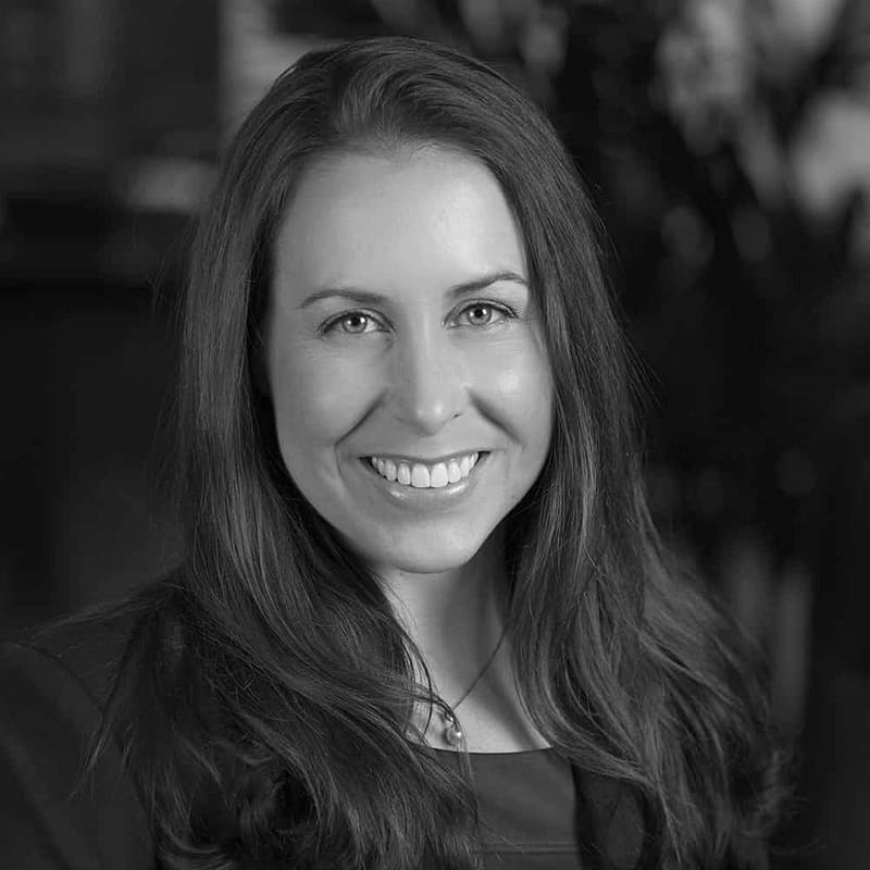 Shelly Kieffer's headshot in black and white in office space.