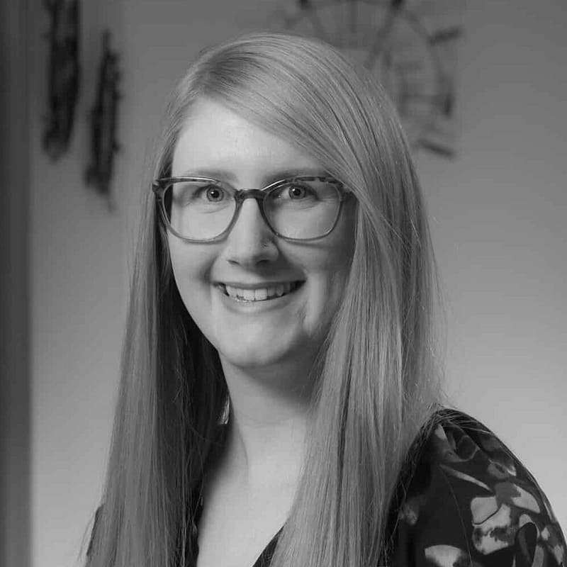 Jourdan Martelle's headshot in black and white.