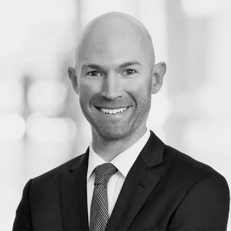 black and white headshot of Josh Vannetti, the Director of Valuation Services for Aldrich.