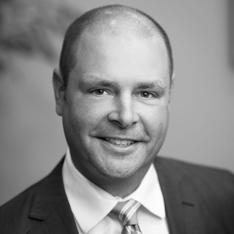 Chris Van Dyke's headshot in black and white.