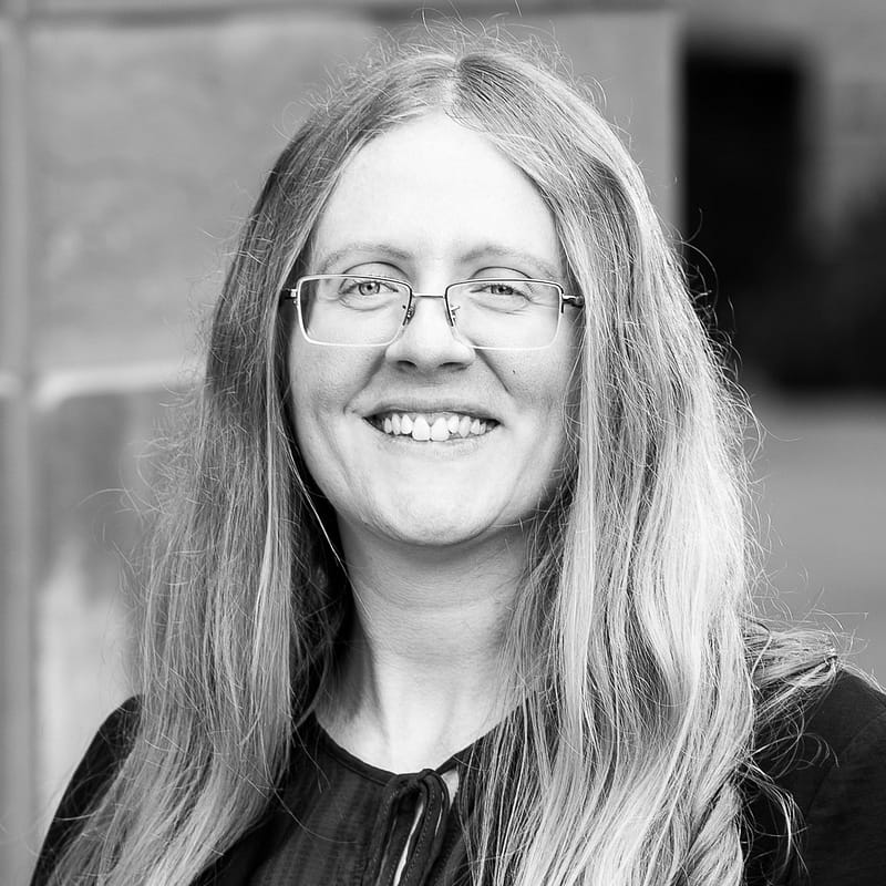 Olivia Parrott's headshot in black and white.