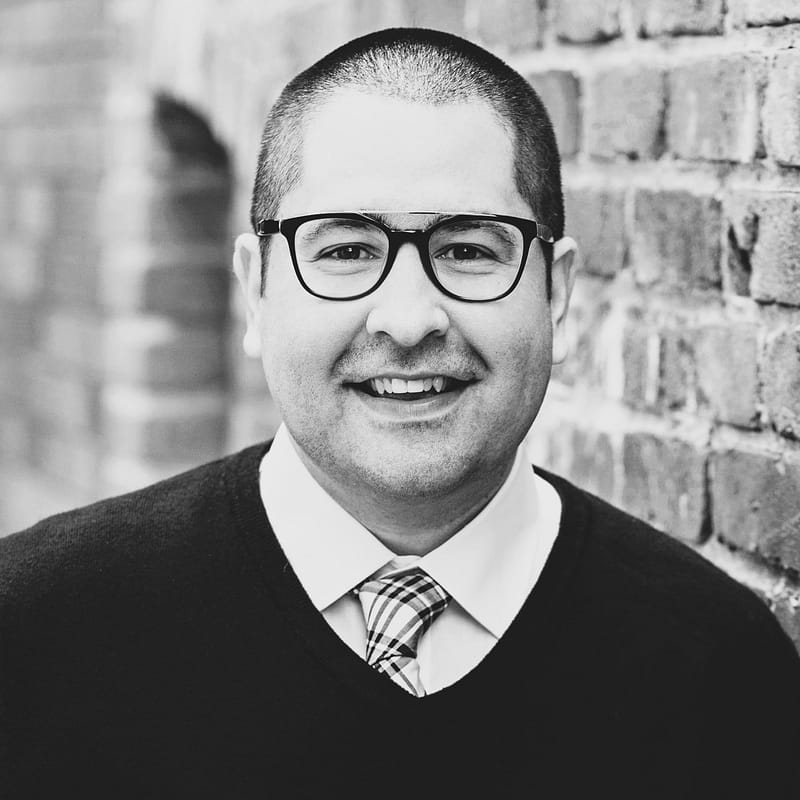 Chris Fonseca's headshot in black and white.