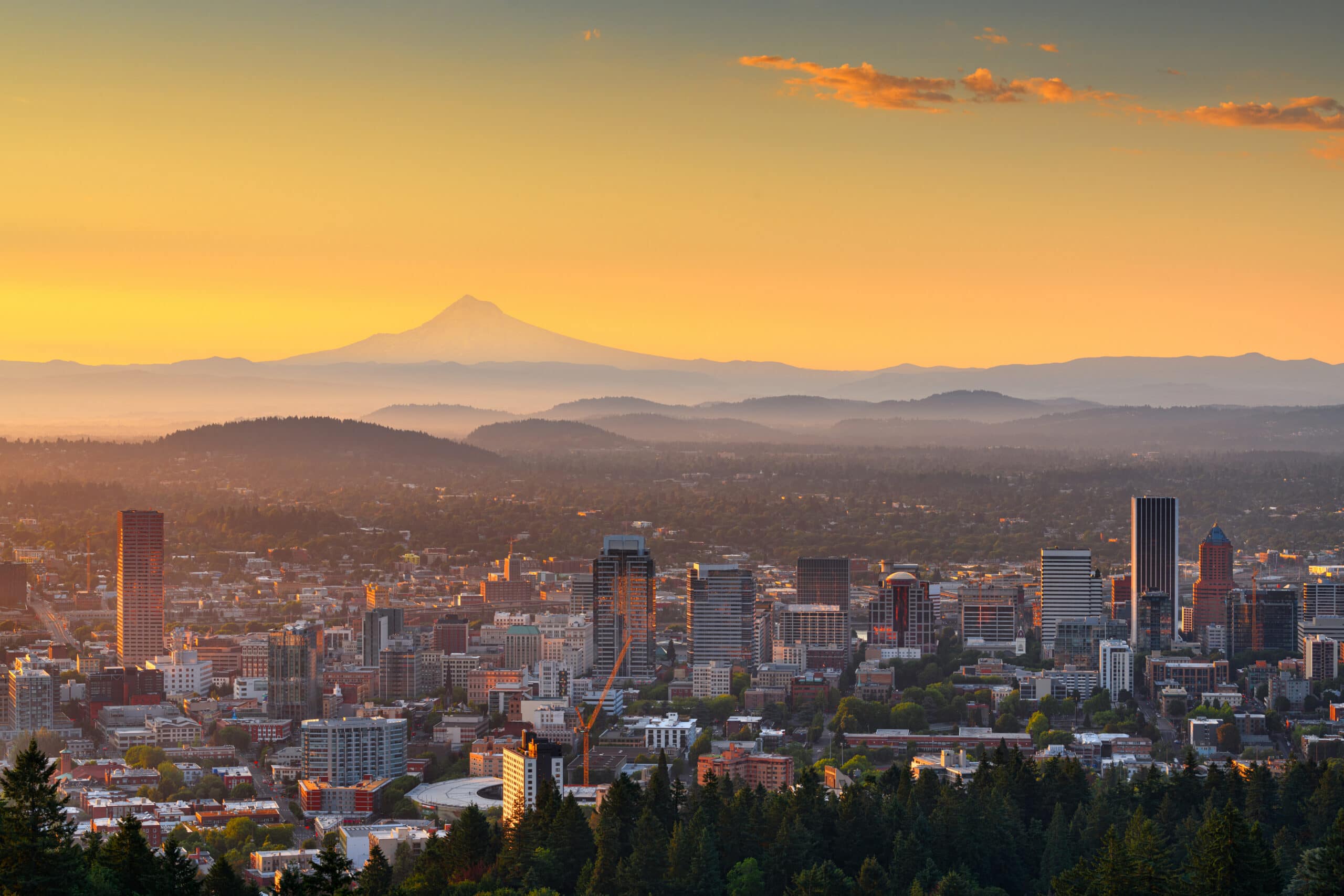Portland, Oregon, USA skyline at dawn with Mt. Hood in the distance at dawn, where Aldrich is among one of the top Private Companies.