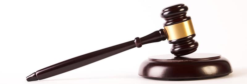 Wooden judge gavel or law hammer and soundboard isolated on white background, close-up. Judgement or auction and conceptual of justice and judgements